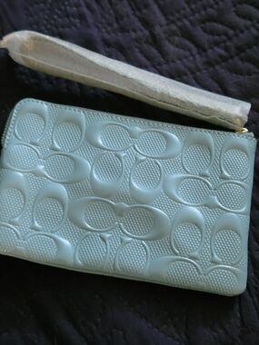 Coach Embossed Signature Leather Wristlet Pouch in Light Blue/ Cream